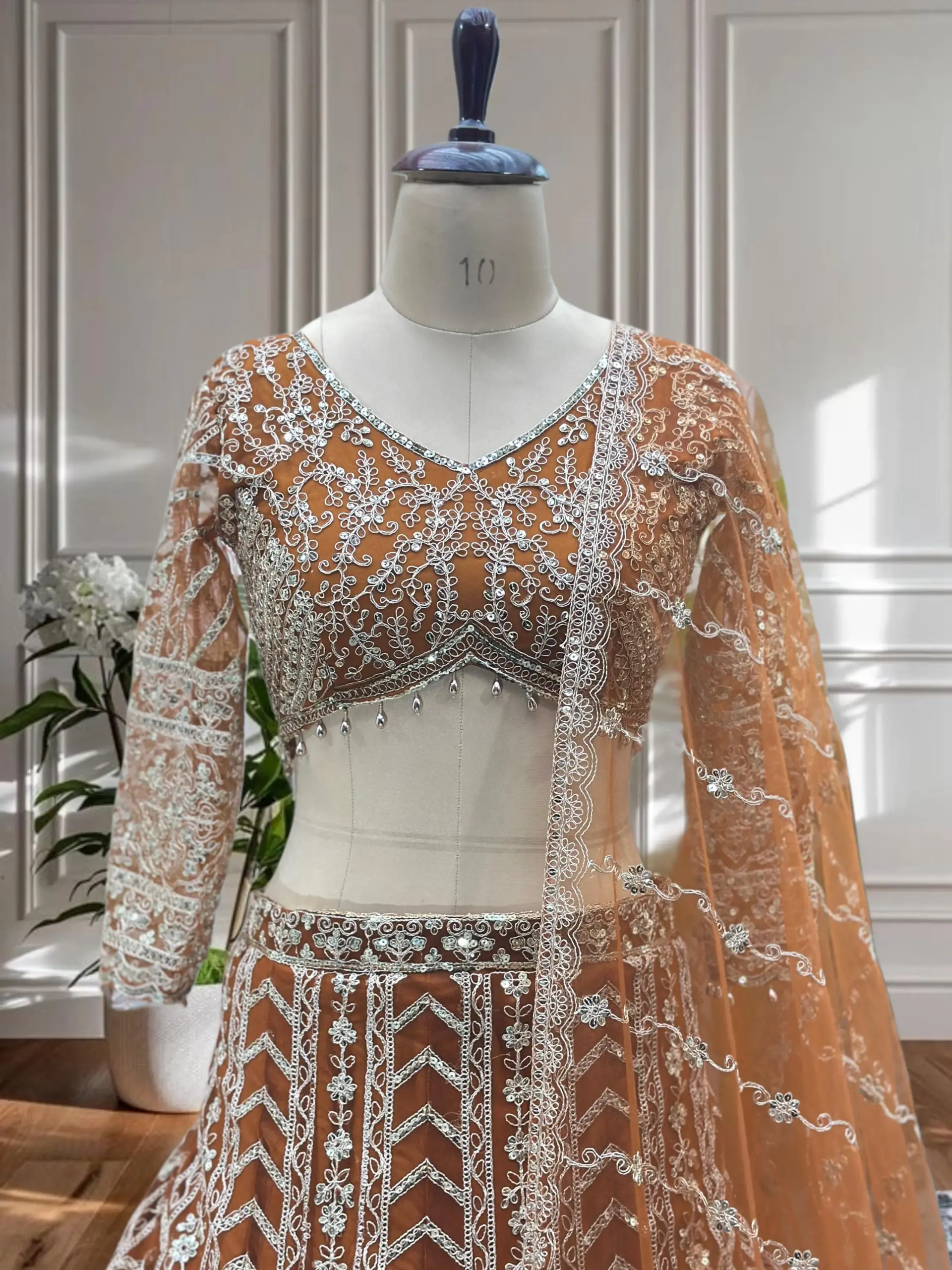 Festive Wear Orange Net Lehenga