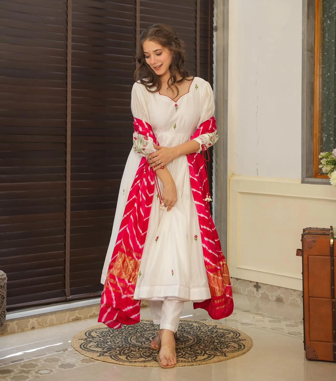 White Anarkali Suit with Red Butta and Big Flair