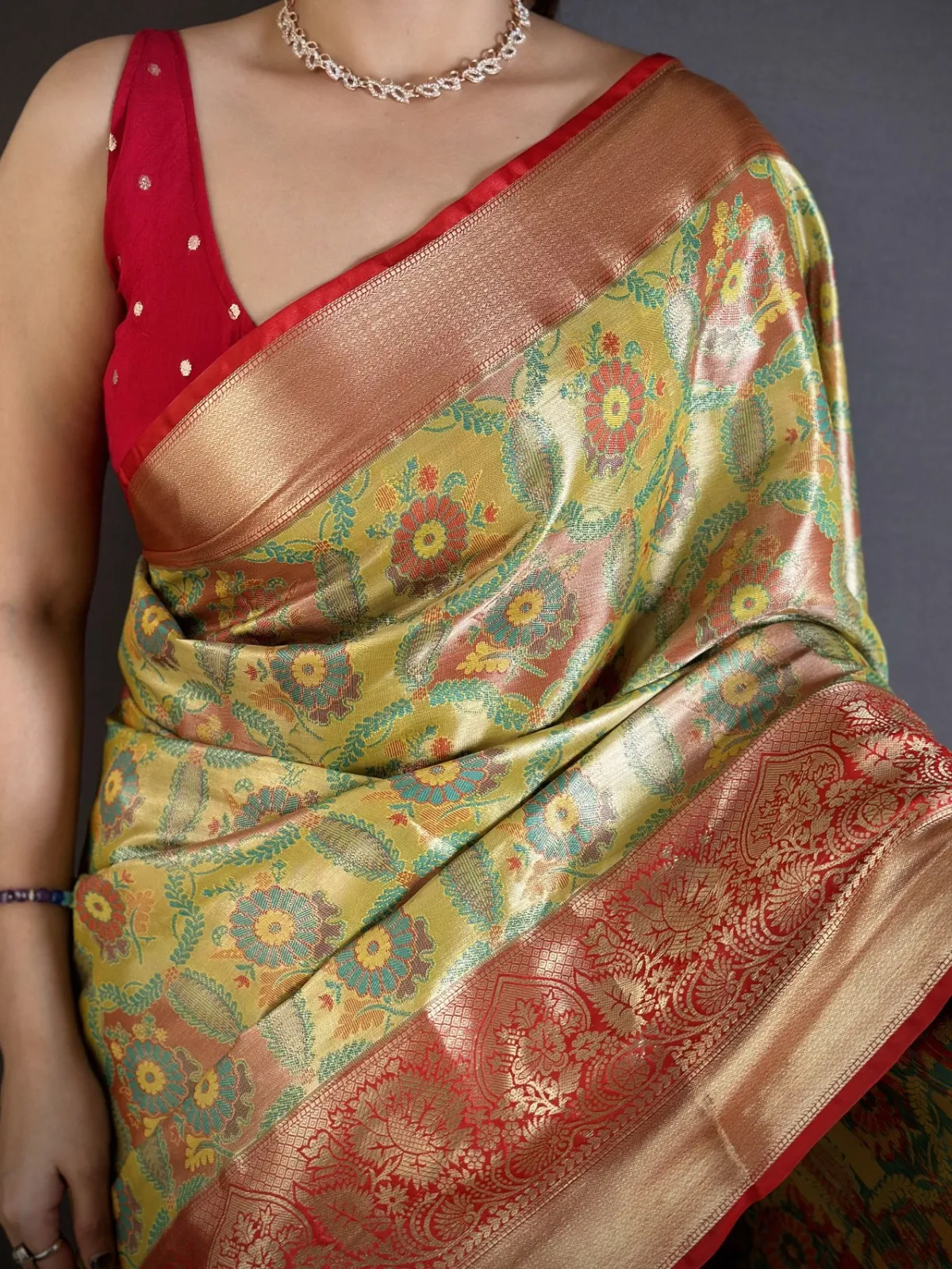 Contrast color traditional Kanjivaram silk saree with zari woven pallu and festive ethnic design