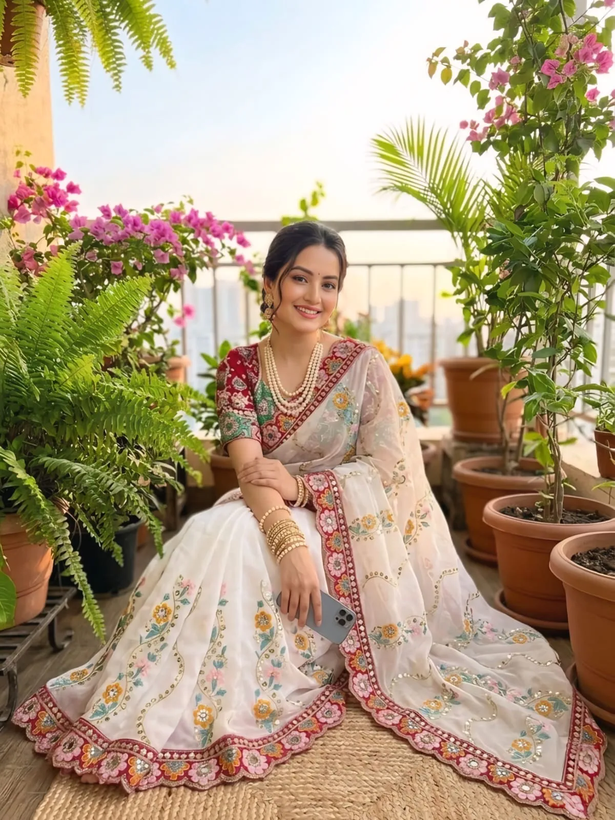 White wedding saree with multi color embroidery and stitched blouse for festive and wedding wear