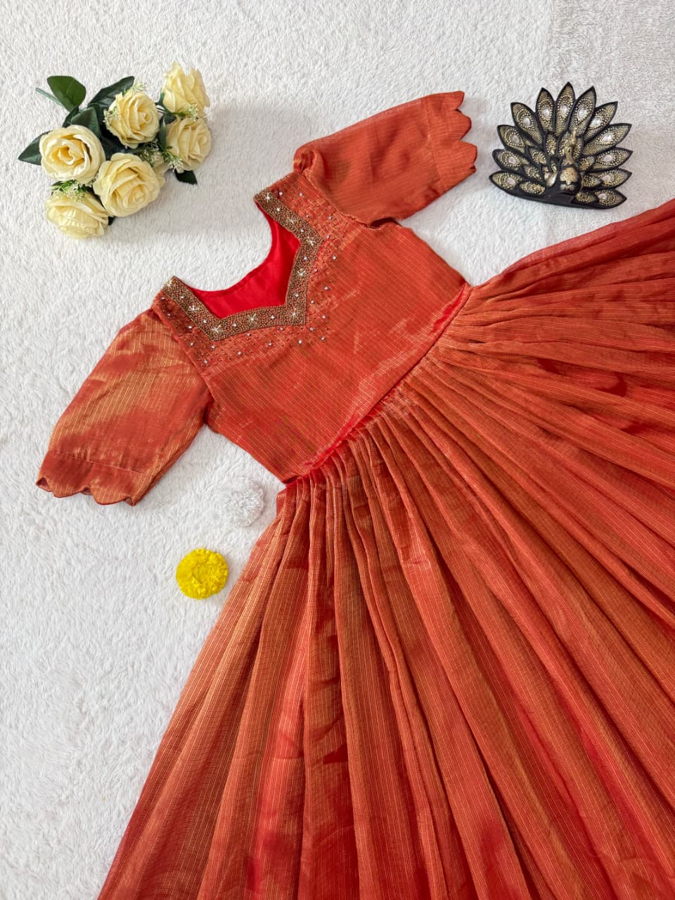 Eye catching Maggam Hand Work Gown Rust
