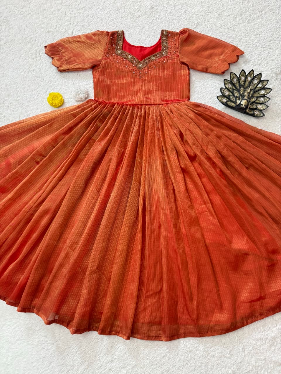 Eye catching Maggam Hand Work Gown Rust