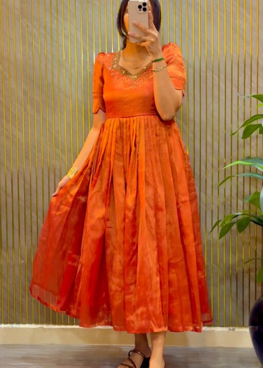 Eye catching Maggam Hand Work Gown Rust