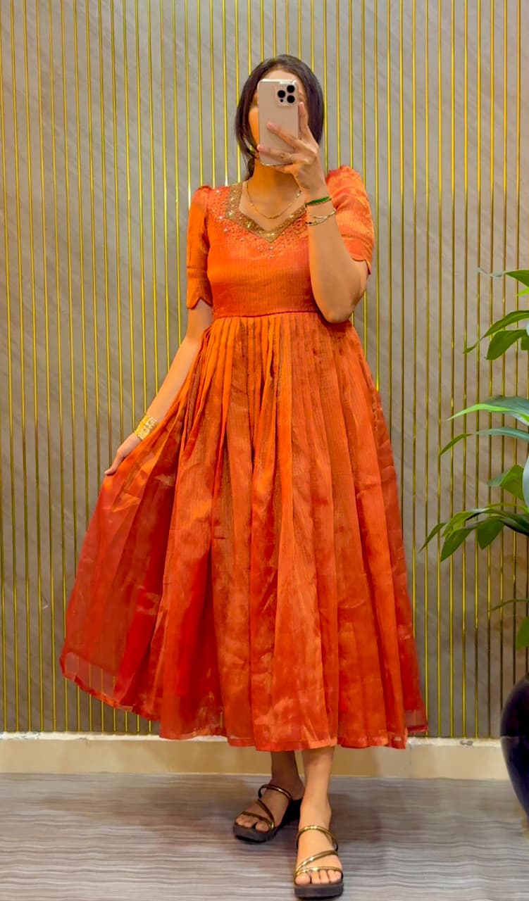 Eye catching Maggam Hand Work Gown Rust
