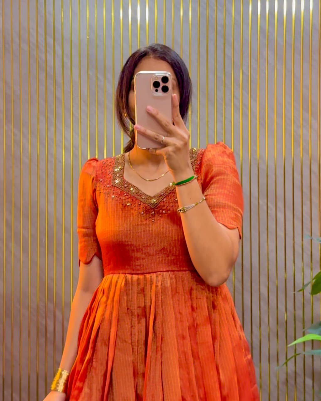 Eye catching Maggam Hand Work Gown Rust