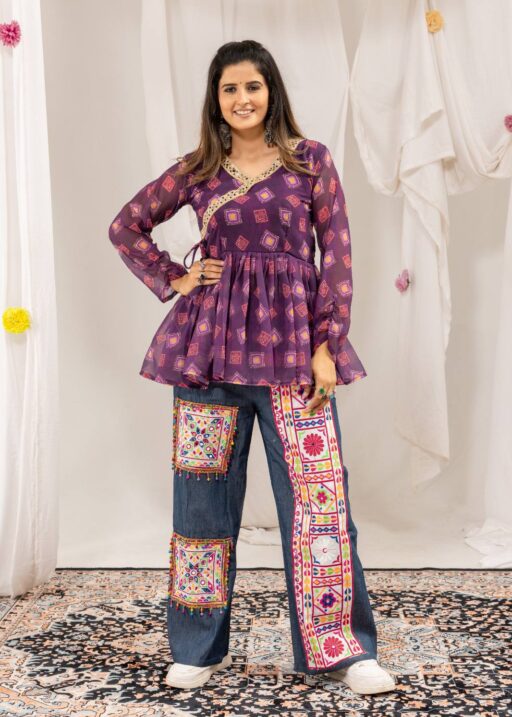 Kutchi work jeans with mirror work tunic top for Navratri Garba wear