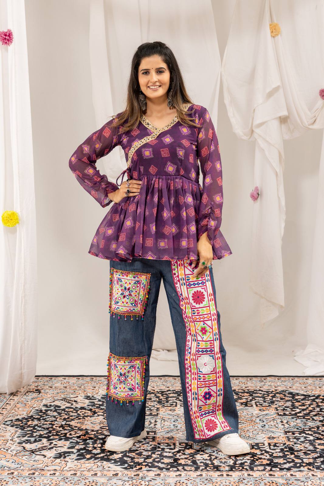 Kutchi work jeans with mirror work tunic top for Navratri Garba wear