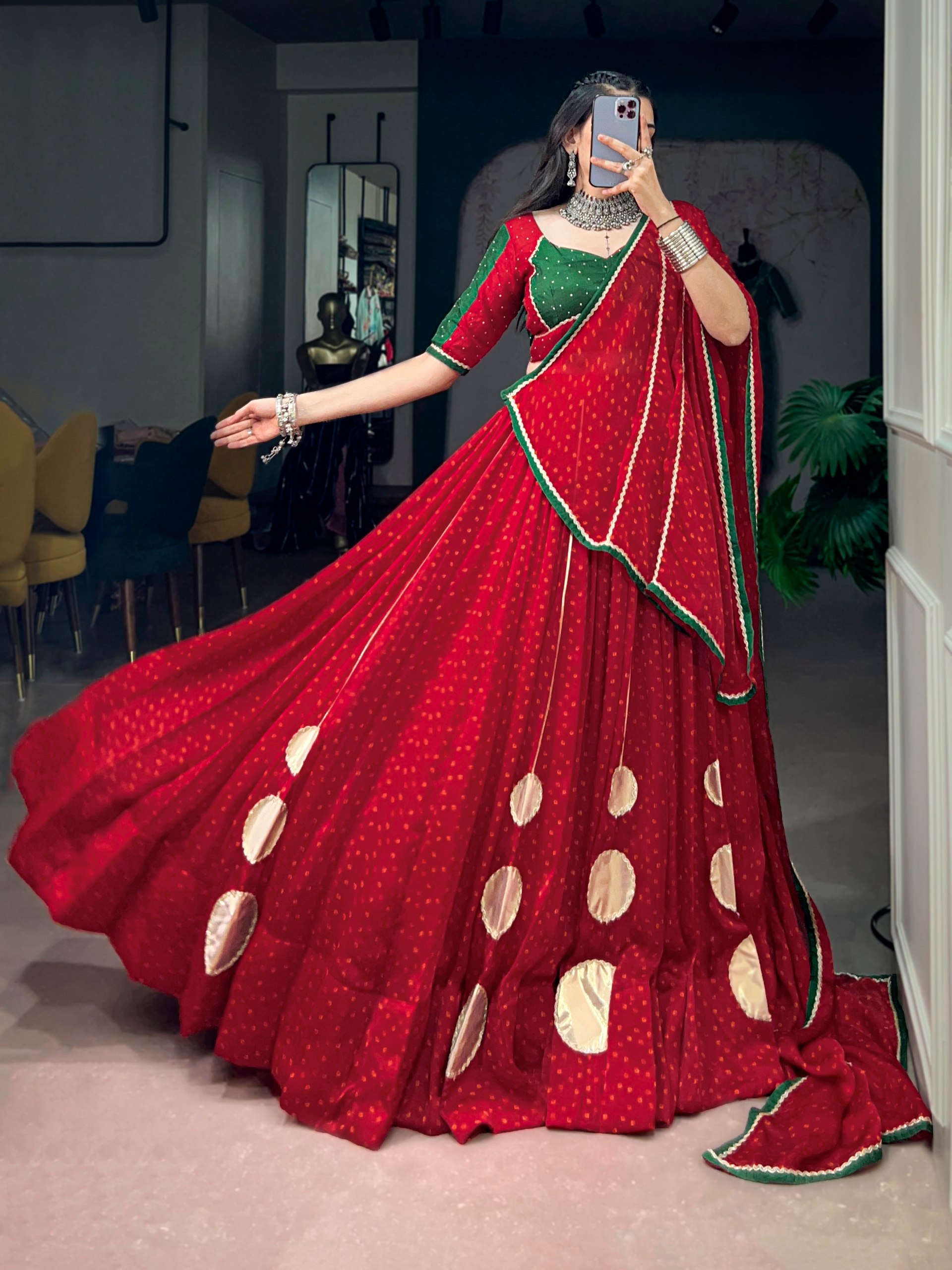 Red Bandhani print lehenga choli with green blouse, Gotta work and 7.5 meter flair