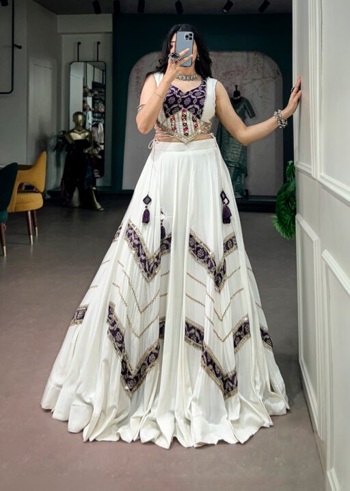 White Gamthi mirror work chaniya choli with blue zigzag print and silver lace detailing